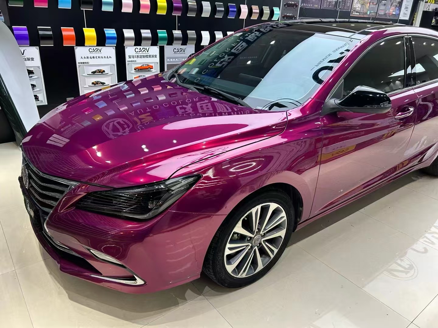 Latest company case about PET Glass Tower Red Car film installation effect